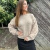 Pull met bloemen mouw in beige