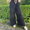 Veloure broek in zwart met leopard riem