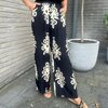 Broek in zwart beige print