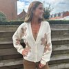 Cardigan met ecru bloemen