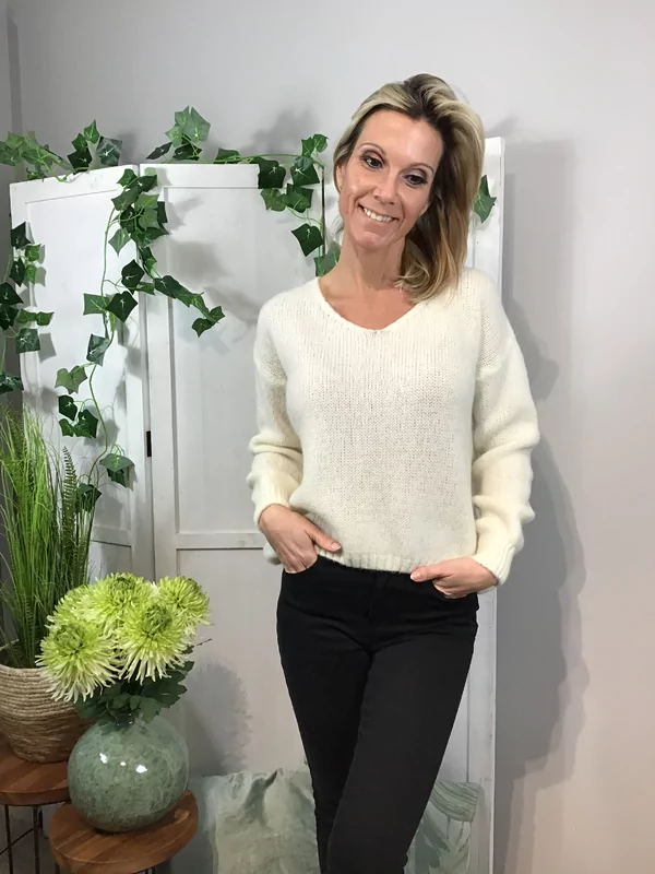 Pull ecru met speciale rug
