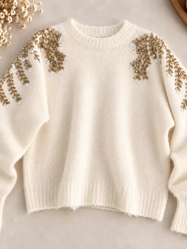 Pull met gouden fantasie in ecru