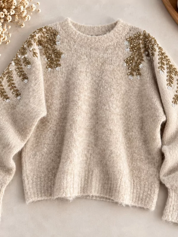 Pull met gouden fantasie in beige