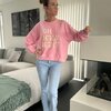 Sweater in roze met wit