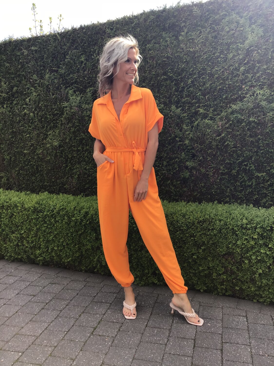 schipper In de omgeving van Voorzieningen Jumpsuit in oranje | Diva Fashion