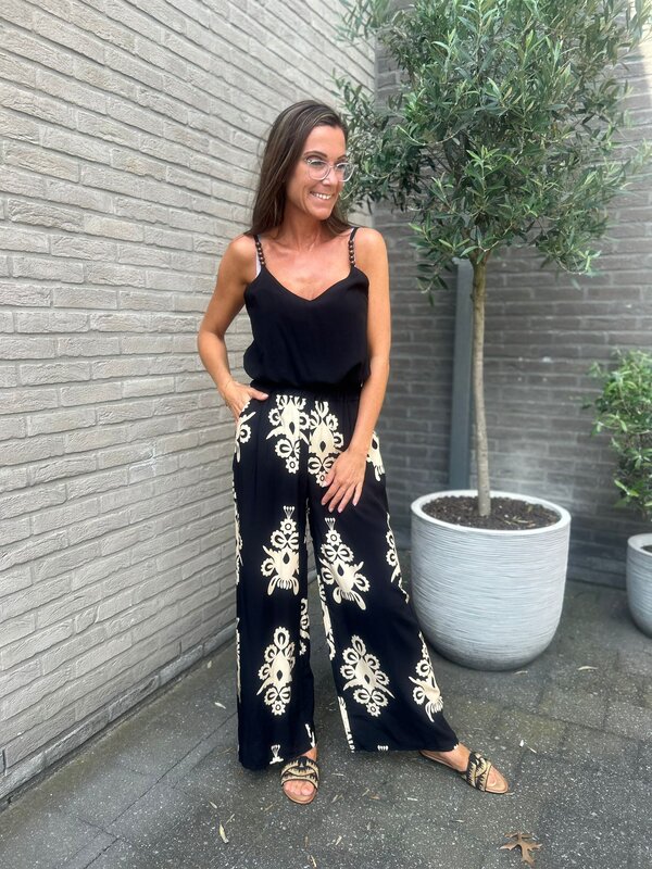 Broek in zwart beige print