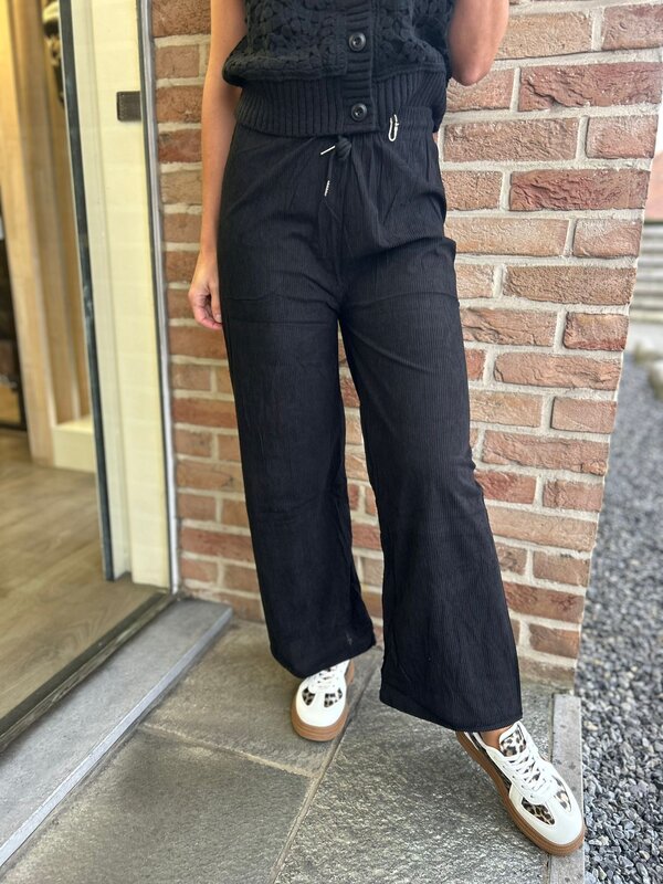 Losse broek in zwart velour