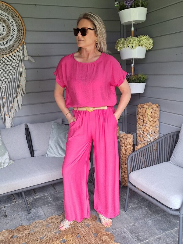 Broek in fuchsia met elastiek en gratis riempje