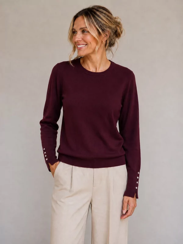 Pull met knoopjes op de mouw in wine