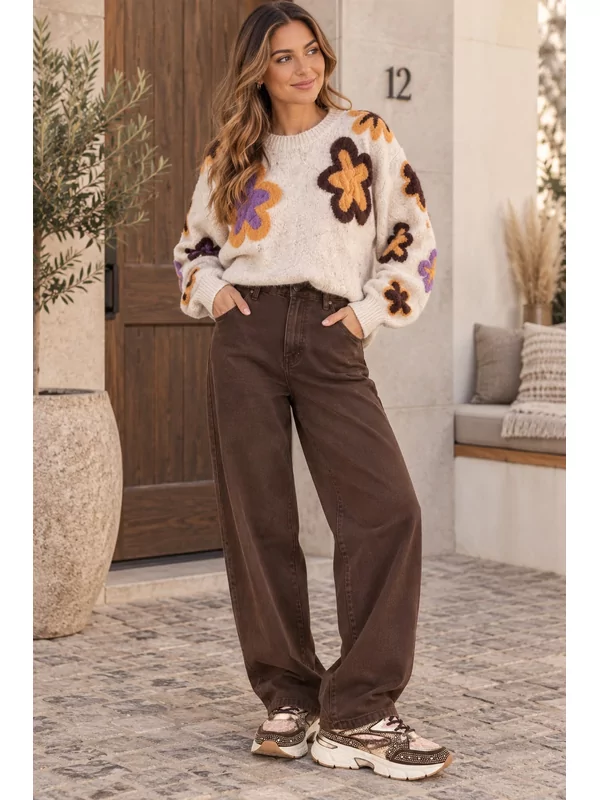 Pull met bloemen in beige