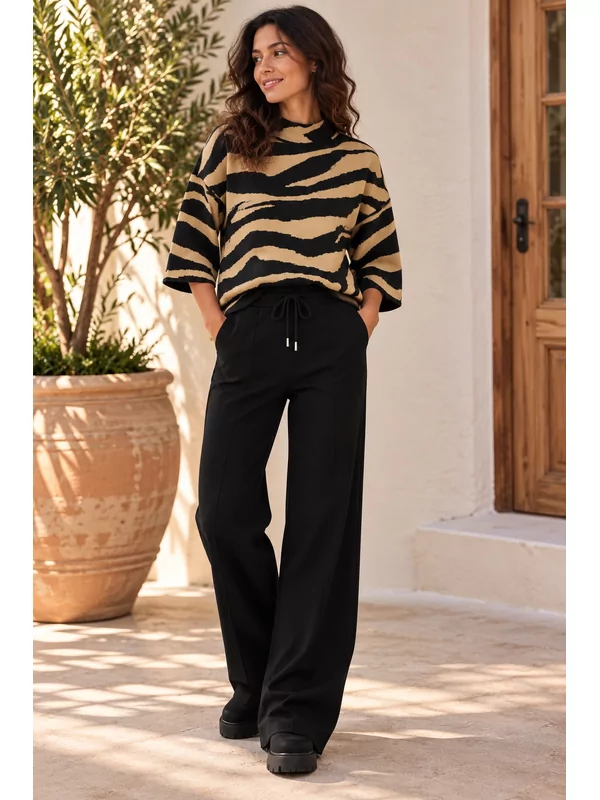 Pull in zebra print beige zwart