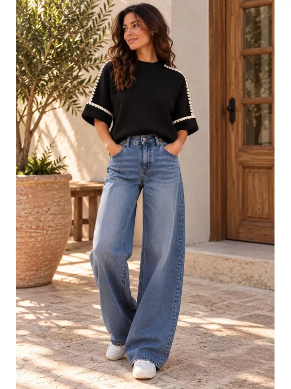 Pull in zwart met witte afwerking