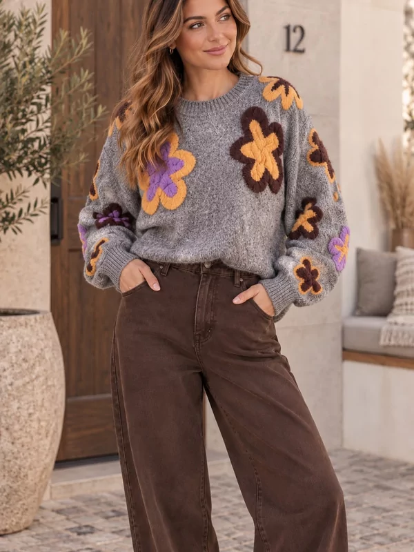 Pull met bloemen in bruin